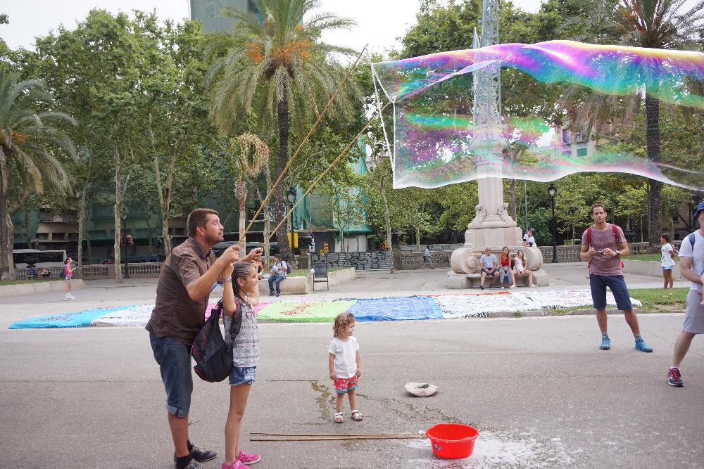 People blowing bubbles in Spain
