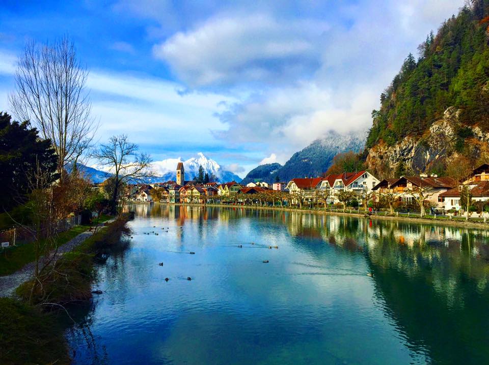 Canal by snow-covered peaks in Interlaken