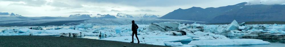 Student looking at icebergs in Iceland