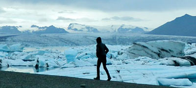 Student hiking by glacier in Iceland