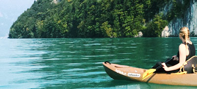 Student kayaking in Switzerland